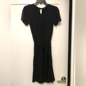 Black GAP dress with sleeves, pleated front, and a tie around the waist